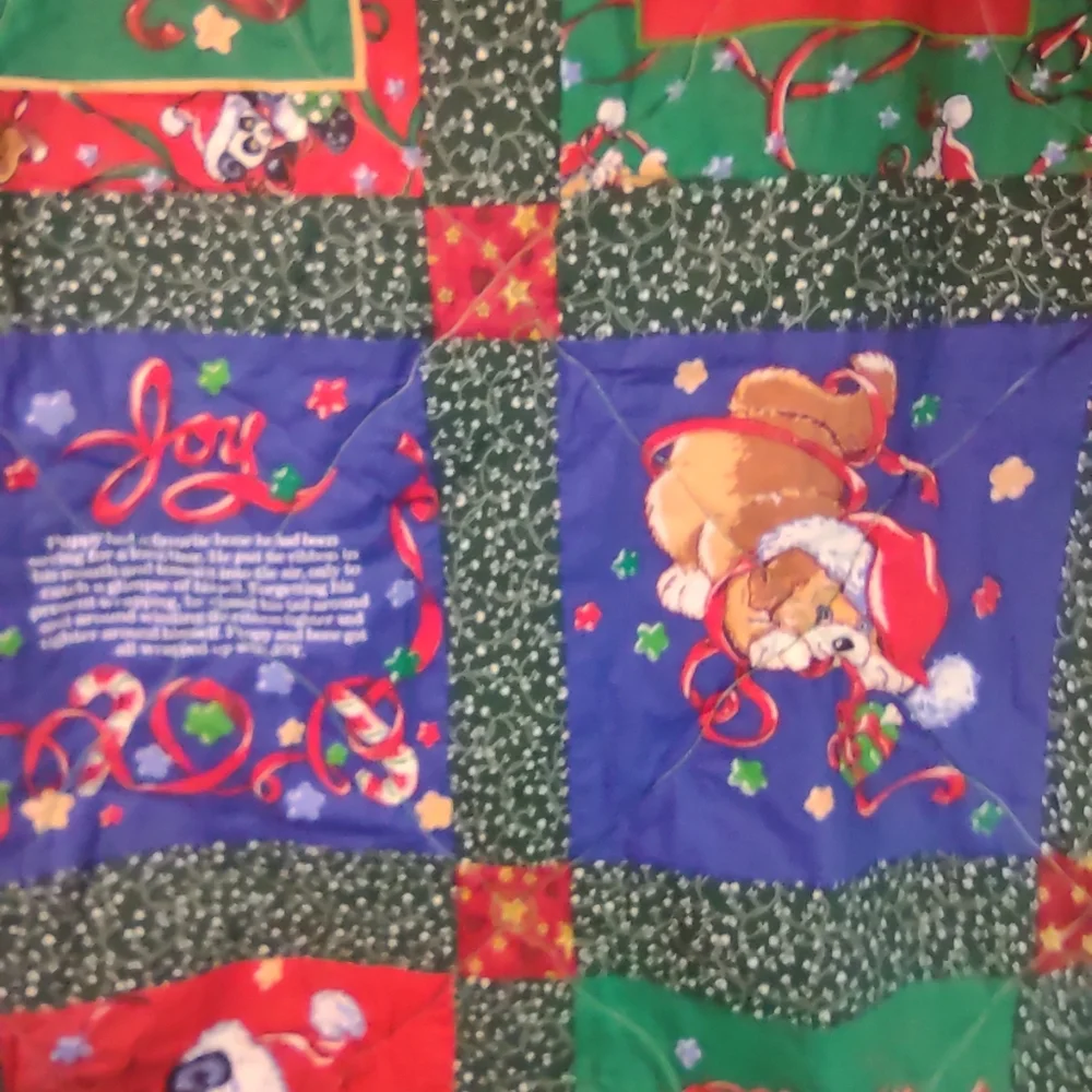Festive Holiday Lap Quilt with Red, Green, and Blue Patterns